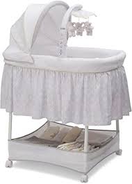 Shop For Simmons Kids Gliding Bedside Bassinet Portable Crib Activity Mobile Arm Featuring Spinning Toys Vibration Nightlight Music Peacock Online Thee In 2020 Bassinet Bedside Bassinet Portable Crib