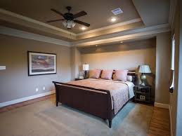 Attractive Bedroom Design With Inspiring Recessed Lighting And Ceiling Fan Also Dark Brown Varnishes Oak Wood Bed Frame Led Beds Bedroom Design Bedroom Layouts