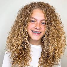 Add tons of volume to your look by making your half updo look extra high on your head. Top 10 Best Curly Haircuts Of 2019 Naturallycurly Com