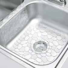 For its contemporary pebble design, great drainage and versatile fit, the idesign kitchen sink mat is our top recommendation. Mdesign Decorative Kitchen Sink Protector Mat Pad Set Quick Draining Use In Sinks To Protect Surfaces