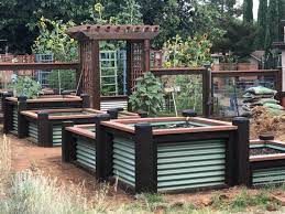 A raised bed planter can be a permanent fixture for perennial plants to settle in and mature. Tiered Garden Beds Etsy