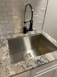 Black kitchen sinks are very attractive, especially if they are incorporated with chrome taps. Kraus Khu101 23 1610 53ssmb Set With Standart Pro Sink And Bolden Commercial Pull Faucet In Stainless Steel Matte Black Kitchen Sink Faucet Combo Tools Home Improvement Kitchen Fixtures