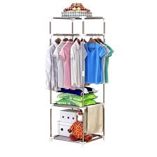 Bamboo frame garment rack with storage basket. Clothes Hanger Stand Storage Rack Life Changing Products