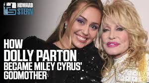 Dolly Parton tells Howard how she became Miley Cyrus’ godmother and  collaborated with her