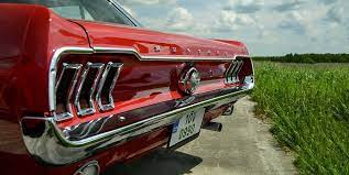 Hd Wallpaper Red Ford Mustang Coupe Parked On Paved Road Near Grass Field At Daytime Wallpaper Flare