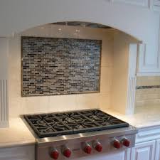 Why you should embrace a solid slab backsplash where to start and stop your backsplash new this week: Kitchen Backsplash Designs Kitchen Backsplash Tiles Westside Tile