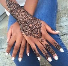 Black Henna Tattoo On The Wrist Henna Tattoo Designs Henna Designs Hand Tattoos