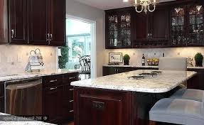In addition to its distinct color, cherry is strong, durable and easy to work with, making it one of the most popular wood types in cabinetry and furniture making. Kitchen Ideas Kitchen Remodel Ideas Cherry Cabinets