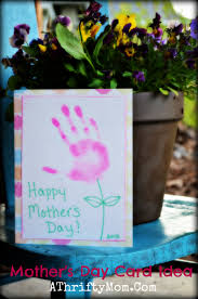 Scroll on for ideas that are sure to make mom smile. Handmade Mother S Day Card Idea Hand Print Flower Card A Thrifty Mom Recipes Crafts Diy And More