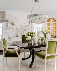 A Dark Brown Dining Table Surrounded By Moss Green Velvet French Dining Chairs And Lit By A Round In 2020 Dark Brown Dining Table Dining Room Design Brown Dining Table