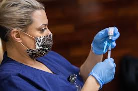 Texas A&M Virologist Says COVID-19 Doesn't Have To Be Endemic