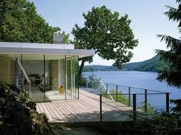 No walls separate the kitchen from the living room creating a great space to relax or entertain in.two bedrooms share a bath and laundry is steps away from the. Lake House By Lhvh Architekten