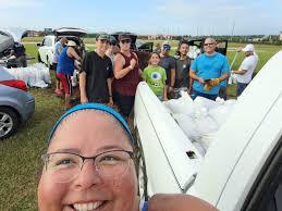Grateful neighbors help with sandbag protection