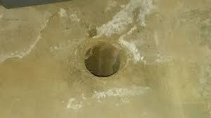 Unknown pvc pipe with putty in basement floor. What Is This 2 Diameter Hole In Basement Foundation Floor Home Improvement Stack Exchange