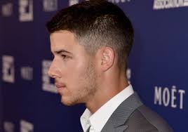 Behold The Evolution Of Nick Jonas S Hair Nick Jonas Hair Nick Jonas Haircut Mens Hairstyles Fade