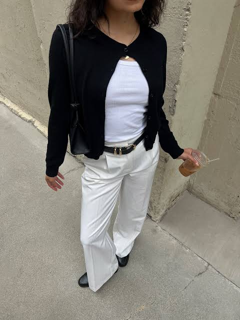 Indecisive weather calls for easy, versatile layers. I pair a tank with  wide-leg trousers and finish with a lightweight cardigan for a minimal,  effortless look. - minimal fashion, capsule wardrobe, elevated basics,