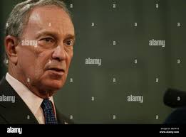 New Jersey Governor-elect Christie (R), left, announces his selection of  Paula Dow, right, to be Attorney General in his administration during a  press conference in Trenton, NJ