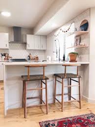 Your old cabinets may no longer serve your storage needs if you have a new set of cookware. Height Of Floating Kitchen Shelves Bigger Than The Three Of Us