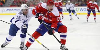 Washington capitals left wing jakub vrana (13) celebrates with centre evgeny kuznetsov (92) right wing tom wilson (43) the hat trick also completed vrana's first career consecutive multigoal games. Capitals Recall Jakub Vrana From Hershey