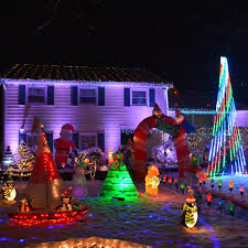 When it comes to decorating with lights, we're used to wrapping them around the tree over and over until we get from top to bottom. Maccary Christmas Home Facebook