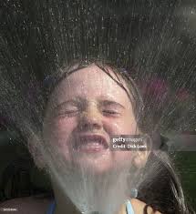 sprinkler time 080801, Megan Rocha 7 is cooling off , things were... News  Photo