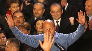 Potrivit unor surse din psd, dacă mircea geoană va câştiga preşedinţia, îl va nominaliza pe ion iliescu în funcţia de premier. Romanian President Basescu Narrowly Reelected