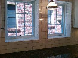 If it's not appropriately sloped, build it up with more mortar to create the requisite slope. Subway Tile Used As Backsplash And Window Sill Tile Window Sill Windows Kitchen Redo