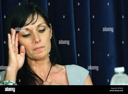 Tabitha Speer, widow of Sgt. 1st Class Chris Speer, who was killed by a  hand grenade that Omar Khadr admitted throwing, speaks to reporters