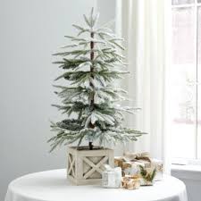 The glow of a christmas tree just makes everything look magical don't you think? Flocked Tabletop Artificial Christmas Tree