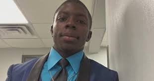 Rose Cipriano Walks On Field At Son's Football Game