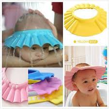 Wash the shampoo out of the hair of the baby. Adjustable Baby Hat Toddler Kids Shampoo Bath Bathing Shower Cap Wash Hair Shield Direct Visor Caps For Children Baby Shower Cap New Baby Products Shampoo Cap