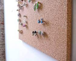 If you need inspiration to shape up your home, read our guide on how to organize your space! Earring Studs Holder Stud Earring Holder Cork Earring Holder Stud Earring Organizer Wall Jewelry Organizer Wall Diy Jewelry Display Cork Board Jewelry