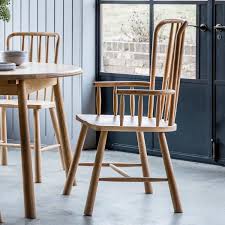 Dining chairs don't just have to look good, but should feel good, too. Spindle Back Dining Chair With Arms Allissias Attic