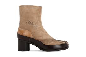 Maison Margiela S Split Toe Tabi Boot Gets Reimagined In Distressed Suede Distressed Suede Boots Boots Suede Boots