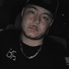 Who can remove old bush stumps and haul debris in Council Bluffs?