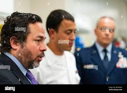 Attorneys Brian Bouffard, left, accompanied by U.S. Navy Lt. Cmdr. Aaron  Shephard, and U.S. Air Force Major Jason Cordova, speak with reporters  after the second day of an arraignment hearing for their