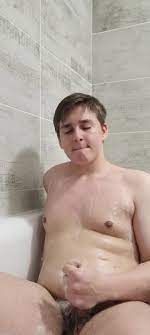Chubby boy washes feet and masturbates in bathtub watch online