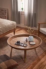Pin By Michele Nelson On Home Decor In 2020 Coffee Table Round Wooden Coffee Table Coffee Table Urban Outfitters