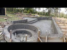Shotcrete undergoes placement and compaction at the same time due to. Swimming Pool Build Concrete Spray Youtube