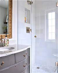 A bathroom remodel may include demolishing the area, installing new flooring, hardware, bathtub, toilet, shower, cabinets, sink, countertops, mirror, tiling a tub and shower surround, connecting plumbing, and painting walls. Bathroom Shower Remodel Ideas