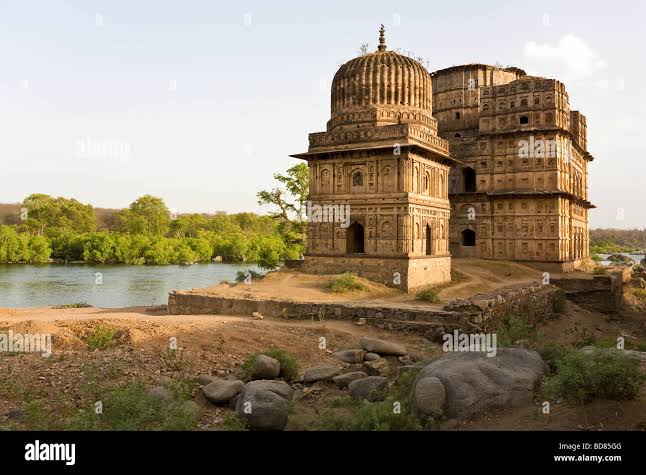 A domed temple/mausoleum on the riverbank at Orchha Stock Photo - Alamy