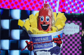 Small hints are given for the viewer guess along. Who Is Sausage On The Masked Singer Celebrity Identity Clues And Theories Revealed Heart