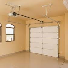 How To Temporarily Convert A Garage To A Guest Bedroom Hunker Garage To Living Space Garage Doors Overhead Garage Door