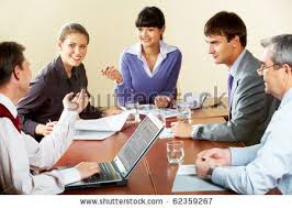 Portrait Of Successful Business People Sitting At The Table And Art Display Kids Success Business Business People