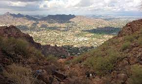 A distinct hump in the landscape offers panoramic views over. City Of Phoenix Limits Access On Trails Amid Coronavirus Concerns