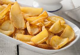 Patate con buccia dal taglio ondulato a v con rivestimento croccante, prefritte e surgelate. Patatine Fritte O Al Forno 10 Ricette Evergreen Fine Food Group