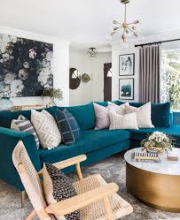 We rejigged the room and removed alot of clutter, along with bringing in coastal driftwood coffee table, gorgeous teal and aqua cushions and. A Stylish Glam Seattle Home Tour Teal Living Room Decor Teal Living Rooms Teal Couch Living Room