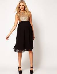 10 Tips For Creating A Winter Maternity Capsule Wardrobe Handy Little Me Pregnant Party Dress Maternity Midi Dress Cute Maternity Dresses