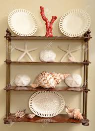 Maybe you would like to learn more about one of these? Shells And Other Ocean Theme Decorations On A Shelf For Home Stock Photo Picture And Royalty Free Image Image 20935940