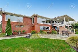 See more of red brick house on facebook. Back Yard Luxury Red Brick House With Tile Roof Green Lawn Stock Photo Picture And Royalty Free Image Image 59955931